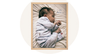 Fotowandbild mit einem schlafenden Baby