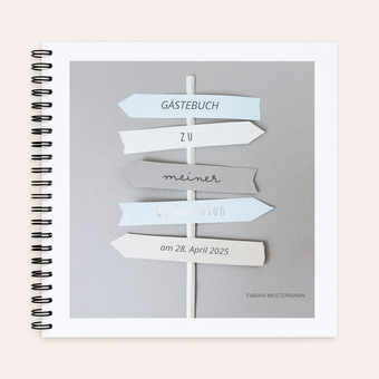 Gästebuch mit Wegweiser zur Kommunkion