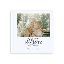 Fotobuch mit Familienbild auf dem Cover