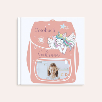 Fotobuch zur Einschulung im Design 'Lachendes Einhorn' mit Foto auf dem Cover